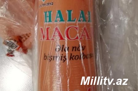 Üzərinə "halal" yazılan kolbasanın içindən çıxanı görüb şok oldu - FOTO